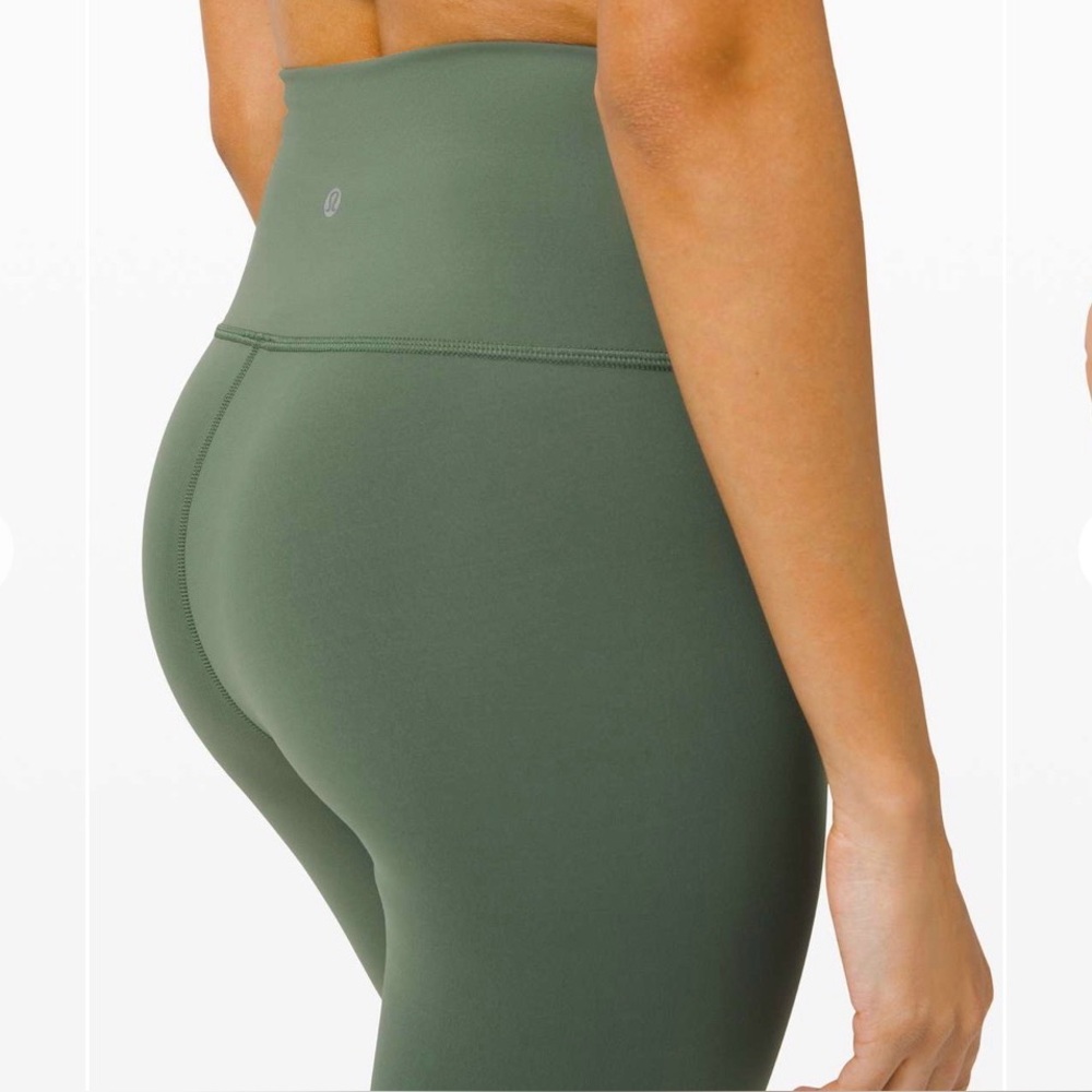 NWOT, Lululemon Wunder Train High-Rise Tight 25”,
Algae Green